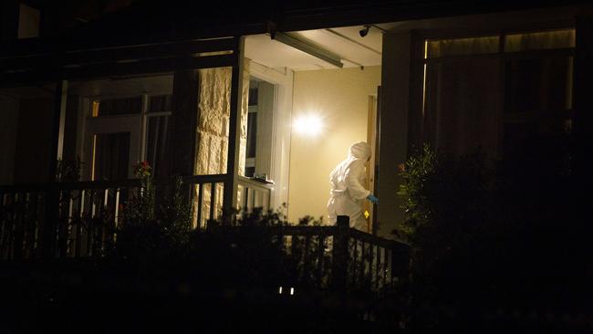 Saturday June 15: Forensics come and go at the house in Epping where a man's body was found. Picture: Tom Parrish