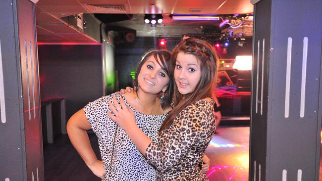 Alexis Williamson, left and Breeony Munster at Bojangles Nightclub, Goondoon Street, Gladstone. Photo Christopher Chan / The Observer
