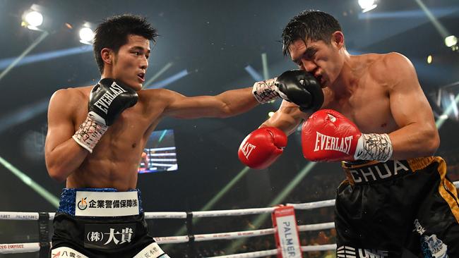 Hironiri Mishiro lands a beautiful jab on Francis Chua. Picture: Gregg Porteous