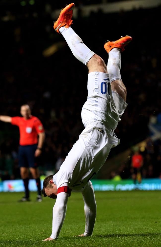 Wayne Rooney celebrates after scoring England's third goal.