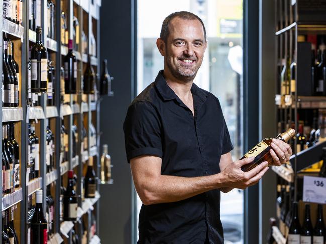 Vintage Cellars Business Category Manager Ed Scully holding the $1m bottle of Japanese whisky Yamazaki 55. Picture - Supplied,