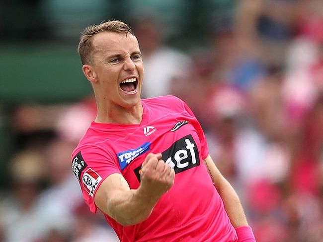 Sixers' Tom Curran celebrates his wicket of Renegade's Nathan McSweeney out lbw during the BBL match between the Sydney Sixers and Melbourne Renegades at the SCG. Picture. Phil Hillyard