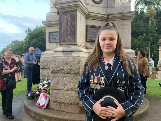 Riverside Christian College student Talahria Moy-Jensen watched on as hundreds gathered around Maryborough’s cenotaph to pay tribute to soldiers past and present on Anzac Day.