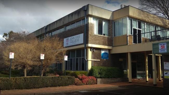 First year women were made to get on their knees while they had goon poured into their mouths in a shameful hazing ritual at the ANU’s John XXIII College.