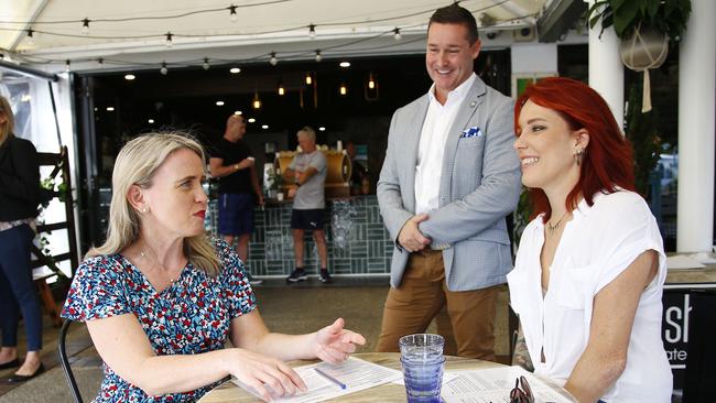 Tourism Minister Kate Jones, with Steven Oakley the general manager at QT Hotels Gold Coast with Hot Shott owner Jenna Finch. Picture: Tertius Pickard