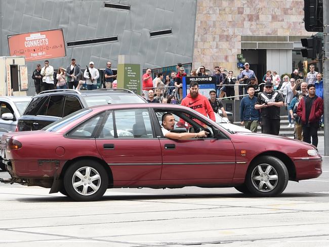 Driver the drove his car up Swanston st and then collected pedestrians down Bourke St, Melbourne. Picture, Tony Gough    Dimitrious Gargasoulas