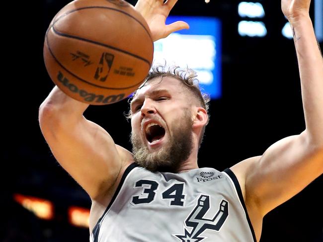 MIAMI, FLORIDA - FEBRUARY 26: Jock Landale #34 of the San Antonio Spurs dunks during the first quarter against the Miami Heat at FTX Arena on February 26, 2022 in Miami, Florida. NOTE TO USER: User expressly acknowledges and agrees that, by downloading and or using this photograph, User is consenting to the terms and conditions of the Getty Images License Agreement. (Photo by Megan Briggs/Getty Images)