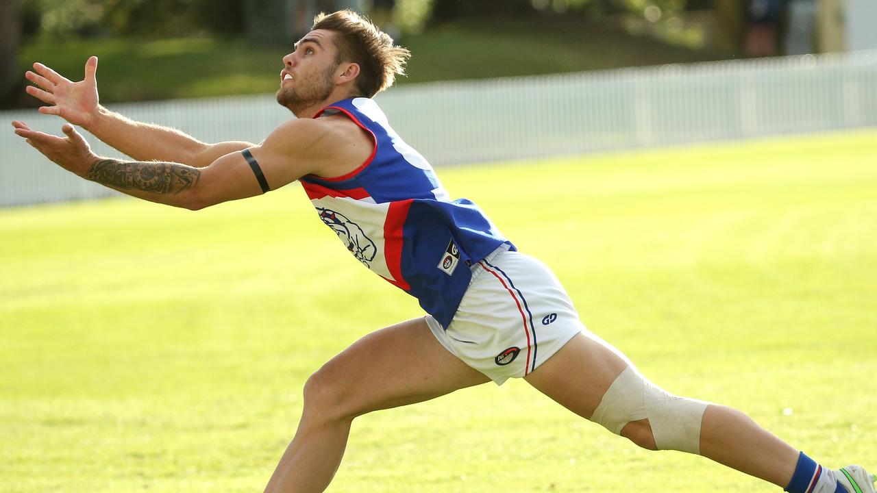 Northern: Jack Mapleson at full stretch for North Heidelberg.