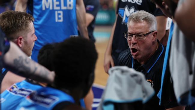 PERTH, AUSTRALIA - OCTOBER 04: Dean Vickerman, head coach of Melbourne United addresses his players at a time-out during the round three NBL match between Perth Wildcats and Melbourne United at RAC Arena, on October 04, 2024, in Perth, Australia. (Photo by Will Russell/Getty Images for NBL)