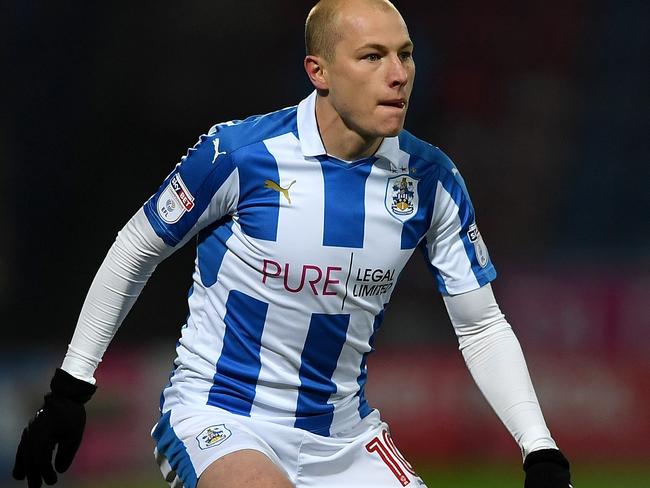 Aaron Mooy steps up to the Premier League with Huddersfield Town.