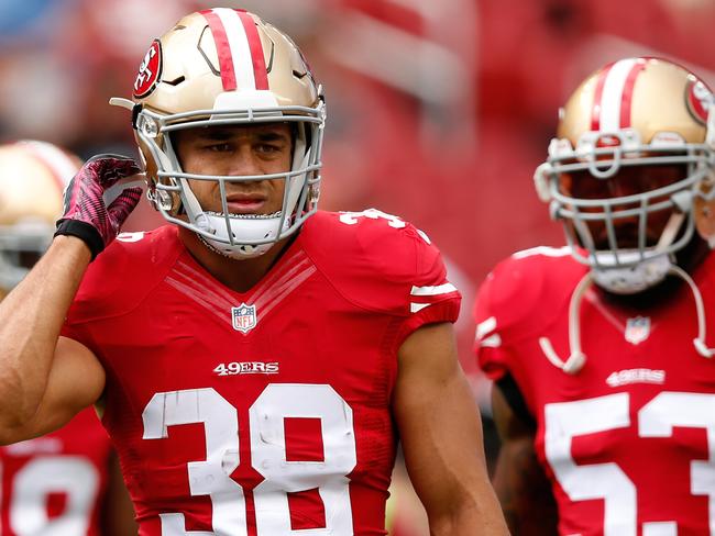 Jarryd Hayne with the man he thinks would make a great second-rower, NaVorro Bowman.