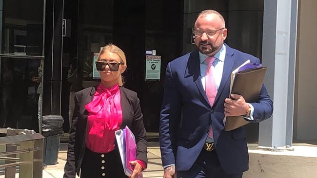 Azzra Hughes leaves court with her lawyer Campbell MacCallum on October 29, 2019. Picture: Lea Emery.