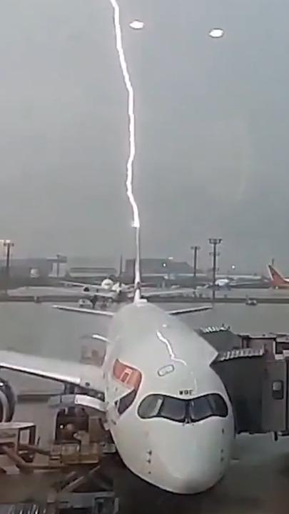 Wild moment flight is struck directly by lightning