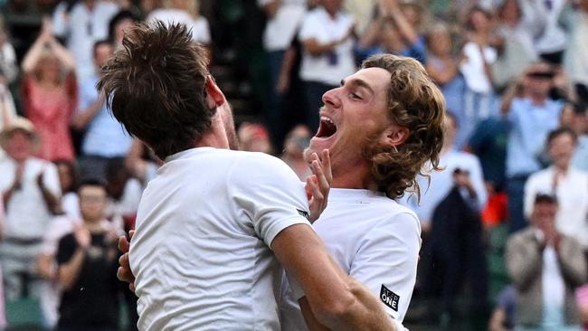 Matthew Ebden and Max Purcell in raptures after winning match point. Picture: Clive Brunskill/Getty Images