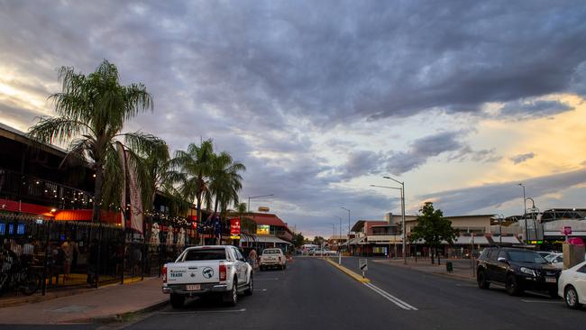 Sunsets over Gregory street and Uncle Tavern on the streets of Alice Springs. Picture: Mark Brake