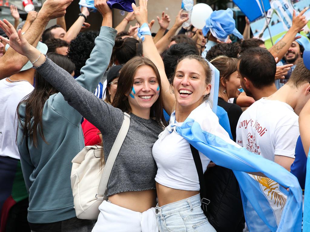 Argentinian fans Candela Garcia Camberio and Paula Martinez gathered at the Sydney Opera House after their World Cup victory. Photo: NCA Newswire/Gaye Gerard