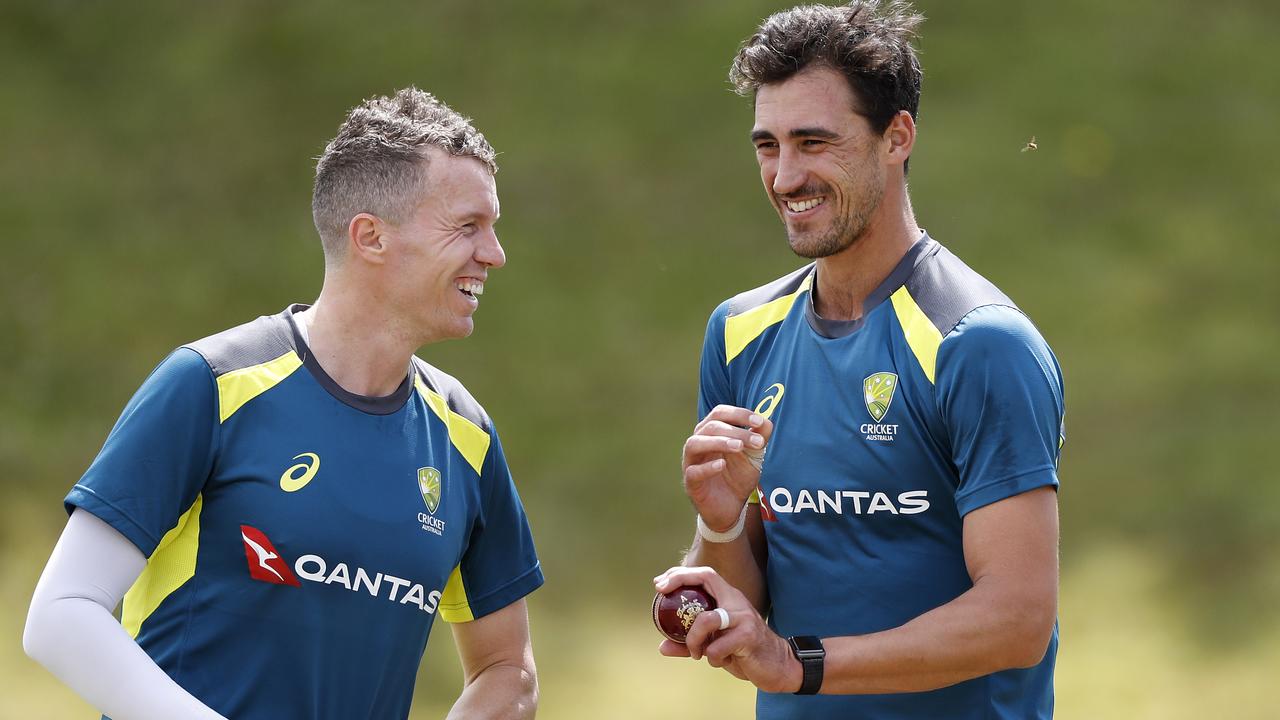 Peter Siddle and Mitchell Starc of Australia. Photo by Ryan Pierse/Getty Images