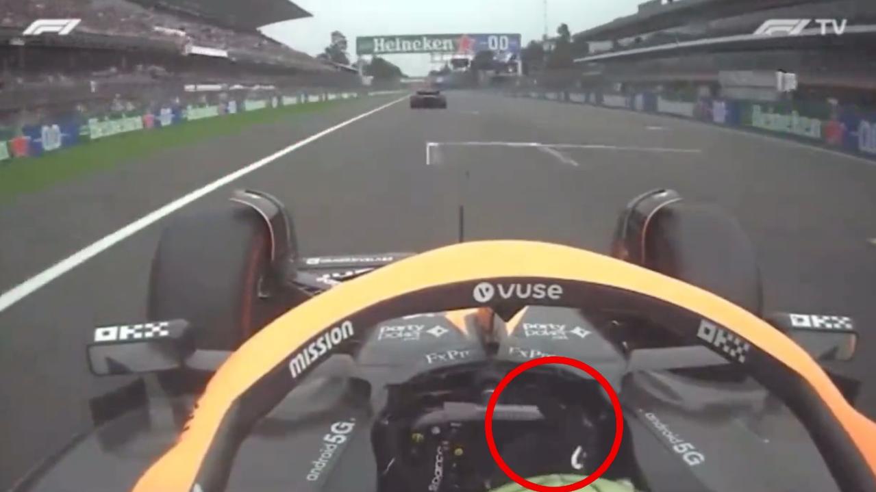Ricciardo shows off a finger gun move.