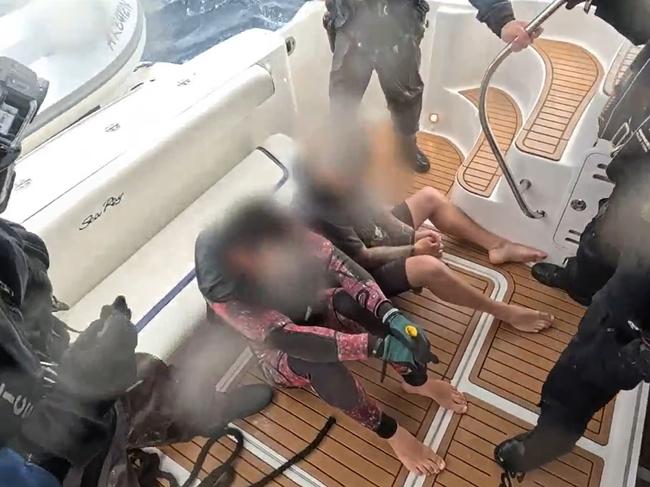 Police arrest Hollingworth and Malcolm. Pic: Supplied by NSW Police.