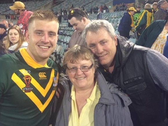 Munster with proud parents Deborah and Steve after a Test win.