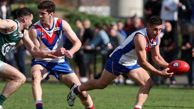 West Preston-Lakeside’s Michael Ercolano is first to the ball. Picture: George Sal