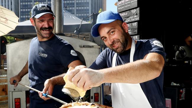 Anthony Mitolo and Ettore Bertonati from Pizzateca cooking their Quattro Formaggi pizza. Picture: CALUM ROBERTSON