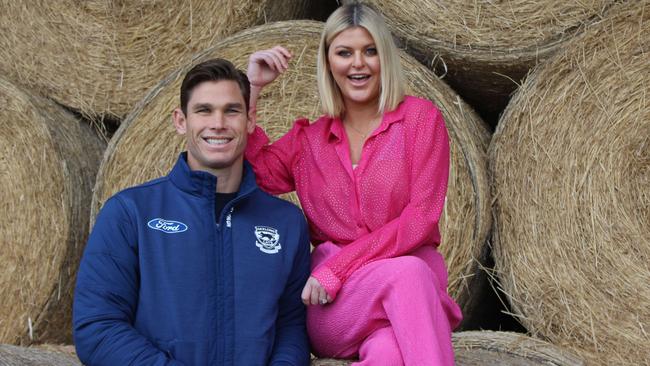 Tom and Emma Hawkins were high school sweethearts who have gone on to become an AFL power couple.