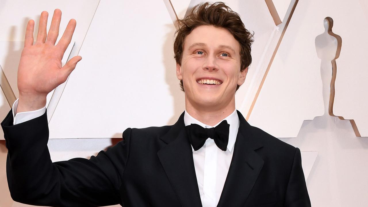 1917 star George MacKay gives his fans a wave. Picture: AFP