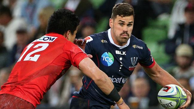 Tom English busts through the Sunwolves’ defence. Picture: AAP