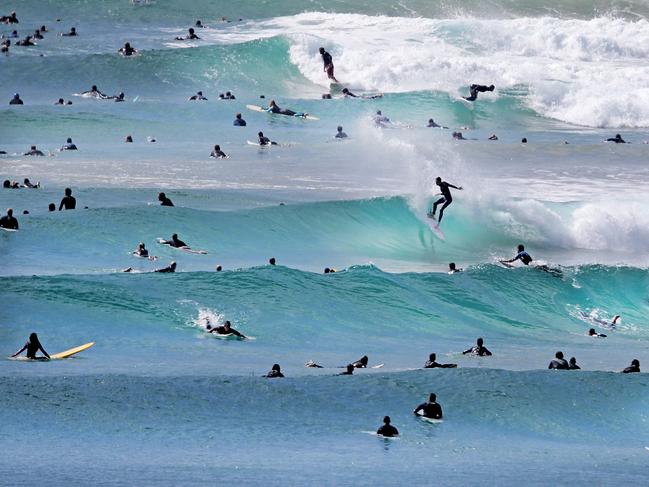 ONE TIME USE ONLY Pumping surf: A crowded line up from Snapper Rocks through to Greenmount. Pic by Luke Marsden.