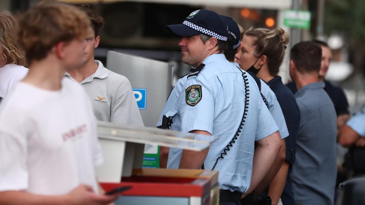 Police monitor numbers on Johnson Street in Byron Bay. Picture: Jason O'Brien