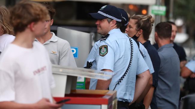 Police monitor numbers on Johnson Street in Byron Bay. Picture: Jason O'Brien