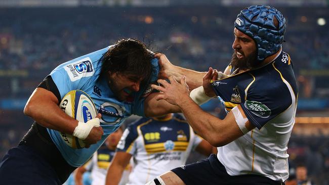 SYDNEY, AUSTRALIA - JUNE 28: Jacques Potgieter of the Waratahs is tackled by Scott Fardy of the Brumbies during the round 17 Super Rugby match between the Waratahs and the Brumbies at ANZ Stadium on June 28, 2014 in Sydney, Australia. (Photo by Mark Nolan/Getty Images)