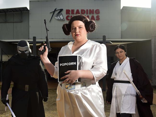 Die-hard Star Wars fan Caitlin Bartholomew (MIDDLE) dresses up as Princess Leia, alongside friends Rick Budd as Kylo Ren and Ash Scott as a Jedi for the new Stars Wars movie. PICTURE: MATT TAYLOR.