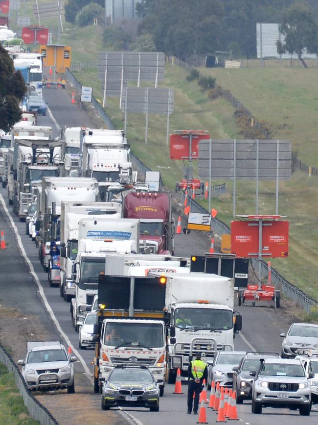 Traffic is banked up at a checkpoint on the Hume Freeway. Picture: Andrew Henshaw