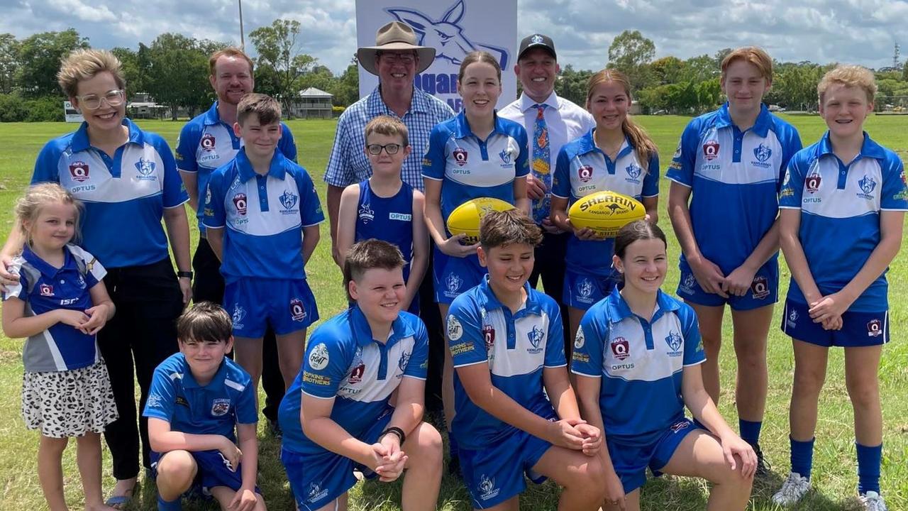 Brothers Kangaroos Australian Football Club president Cameron Wyatt, Member for Rockhampton Barry O'Rourke, Deputy Premier and Minister for Infrastructure Steven Miles and Brothers club members at the announcement of the funding for upgraded lighting at Kele Park.