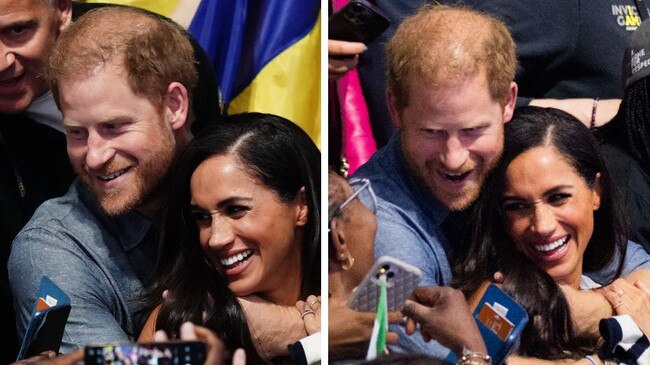 Harry and Meghan have put on a loved-up display at the Invictus Games.