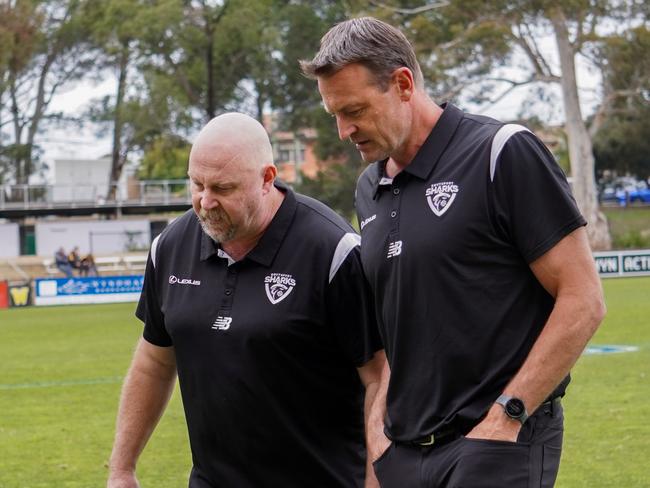 Incumbent Southport head coach Matt Primus (right) and the outgoing Steve Daniel talk tactics. The pair have been at the Sharks together since 2019. Picture: Southport Sharks.