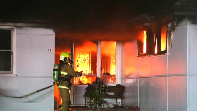 A crime scene has been established at a Sadleir home after molotov cocktails were hurled through a window, starting a huge fire. Picture: Bill Hearne