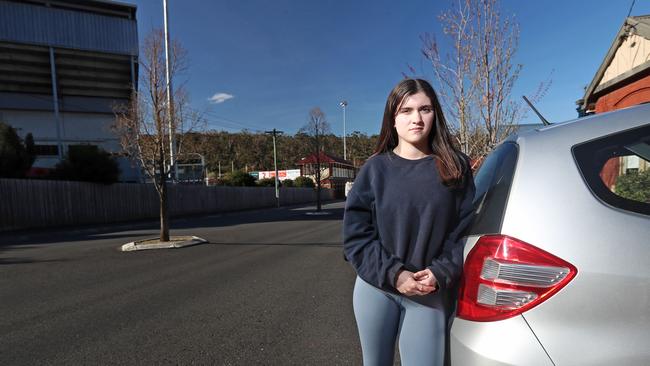 North Hobart resident Ebony Harris, 18, is frustrated about being trapped in her driveway during footy games at North Hobart Oval. Picture: LUKE BOWDEN