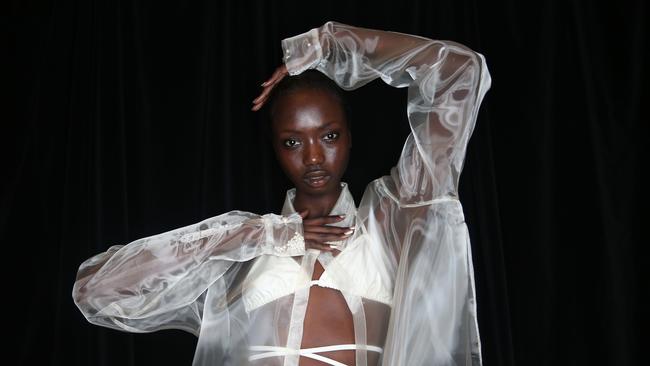 A model prepares backstage ahead of the Karla Spetic show at Mercedes-Benz Fashion Week. Picture: Getty