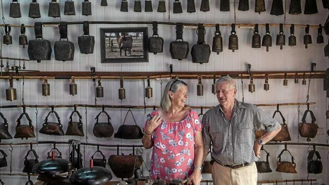 Partners Sheila Moore and Ross McLeod in front of some of their 1300 bells they are putting up for sale as a collection. Picture: Adam Hourigan