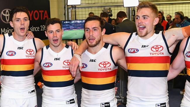 Jake Lever, Rory Atkins, Richard Douglas and Hugh Greenwood after a Crows win last year. Picture: Quinn Rooney/Getty Images