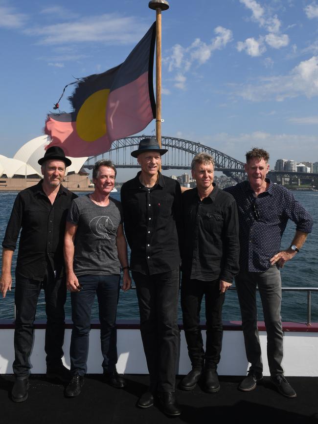 Midnight Oil on Sydney Harbour in February 2017, with Bones Hillman far right. Picture: Dean Lewins