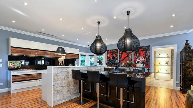 The European-inspired kitchen includes imported German cabinetry.