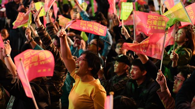 Supporters react after confirmation that Tsai Ing-Wen of the Democratic Progressive Party has been re-elected as President in January 2020.