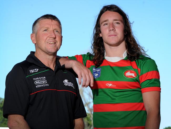 Souths legend Craig Coleman with his son Liam in 2013. Picture: Daniel Aarons.