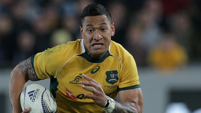 Australia`s Israel Folau makes a run to score a try against New Zealand in the International Rugby Test Match at Eden Park in Auckland, New Zealand on Friday, April 10, 2015. (AAP Image/ David Rowland) NO ARCHIVING, EDITORIAL USE ONLY