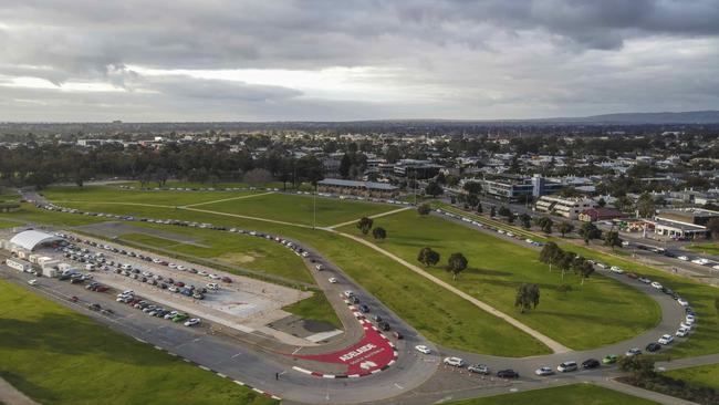 Cars line up for hours at the Victoria Park testing station. Picture: Roy VanDerVegt