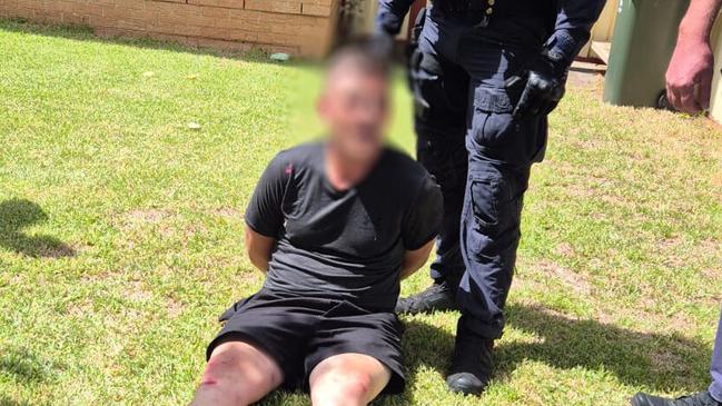 Police arresting Matthew Langford, aged 34, wanted on an outstanding warrant for alleged breach of bail, firearms and traffic offences. Picture: NSW Police